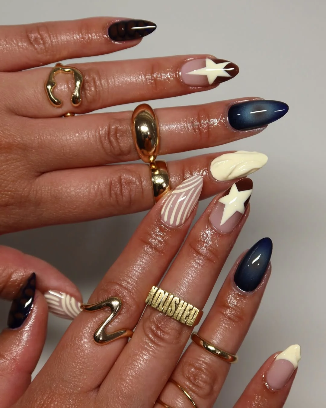 july nails design ideas 2026 Moody Western Stars in Navy, Cream, and Cocoa