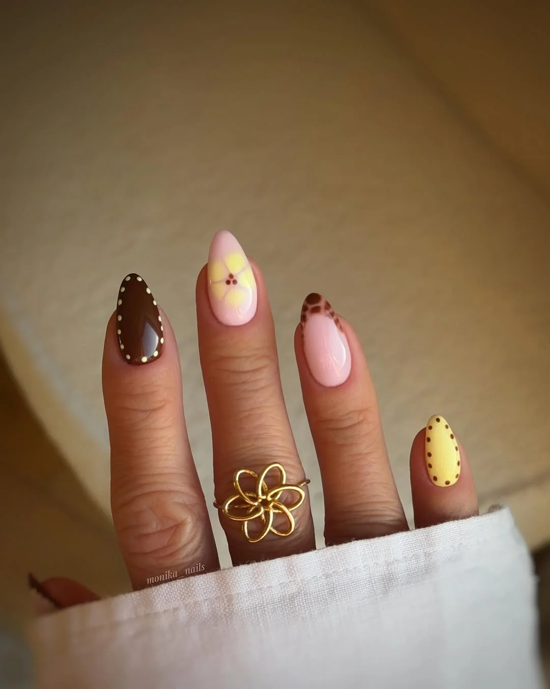 july nails design ideas 2026 Soft Retro Pastels With Daisy and Dot Accents