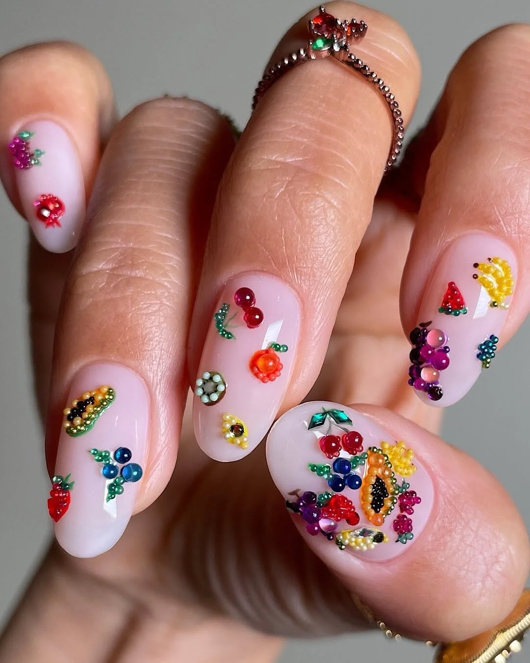 july nails design ideas 2026 Jeweled Fruit Nails With Tiny 3D Embellishments