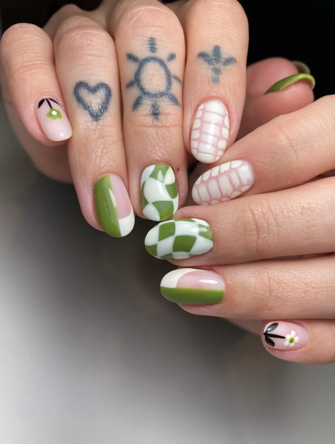 july nails design ideas 2026 Olive Green Picnic Nails With Daisies And Soft Grid Art