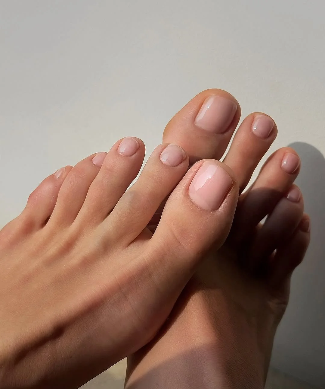 july toe nails design - summer ideas 2026 Sheer Nude Gloss for Barely-There Summer Toes