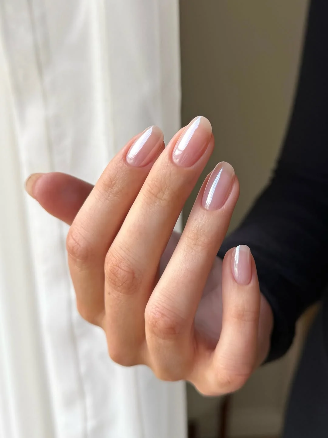 june manicure ideas 2026 Pearl Glazed Almond Nails With a Soft Pink Base