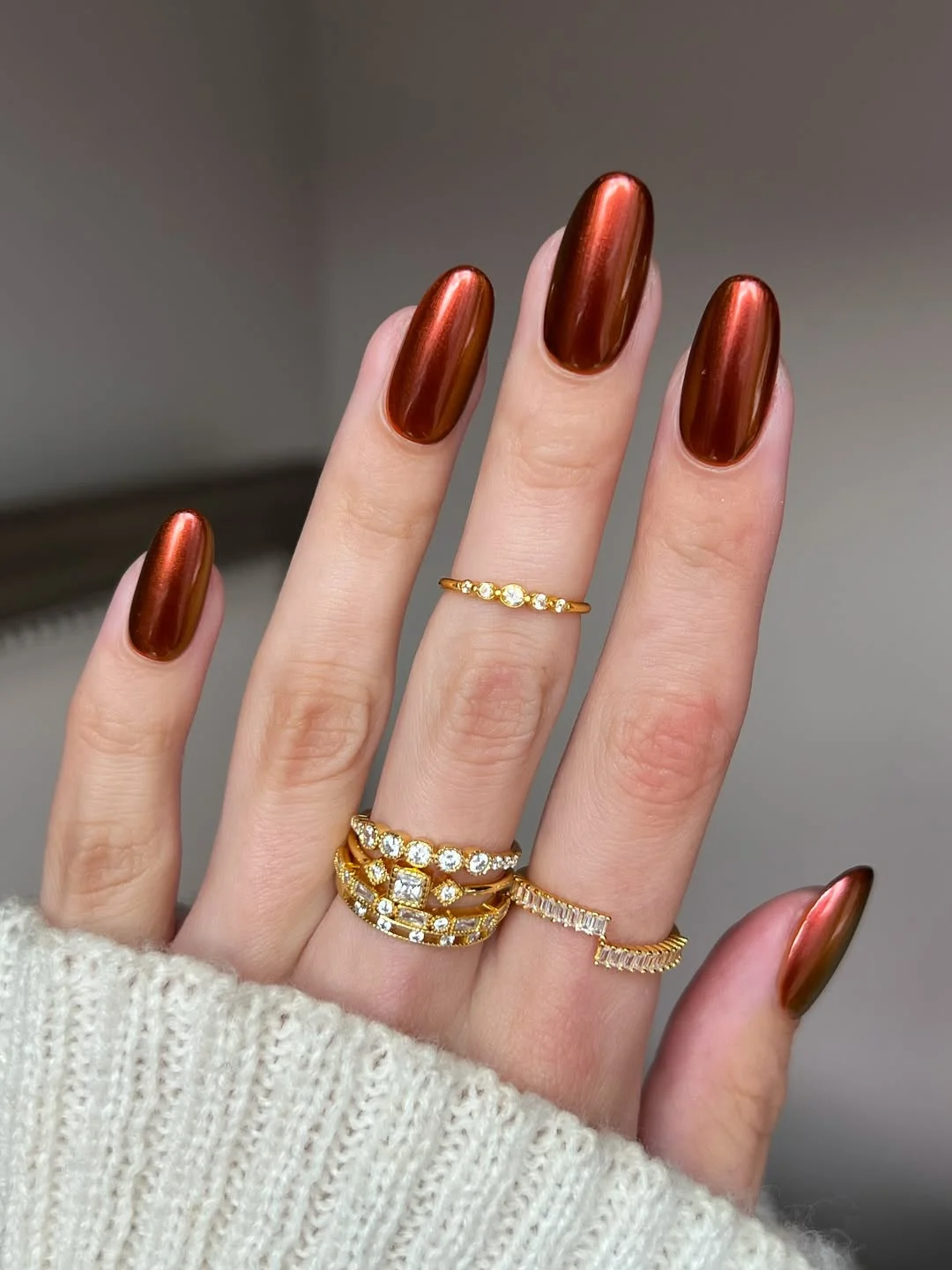 june manicure ideas 2026 Copper Chrome Nails With a Mirror-Like Finish