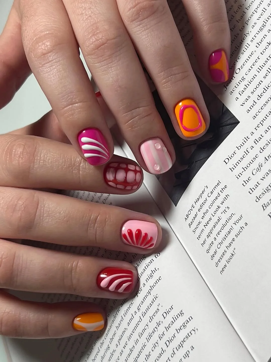 june manicure ideas 2026 Retro Candy Mix With Pink, Orange, and Red Details