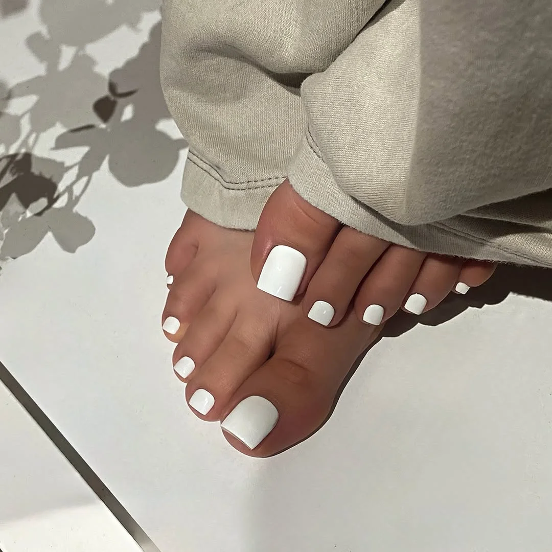 june pedicure ideas 2026 Bright White Pedicure With a Sunlit Minimal Look