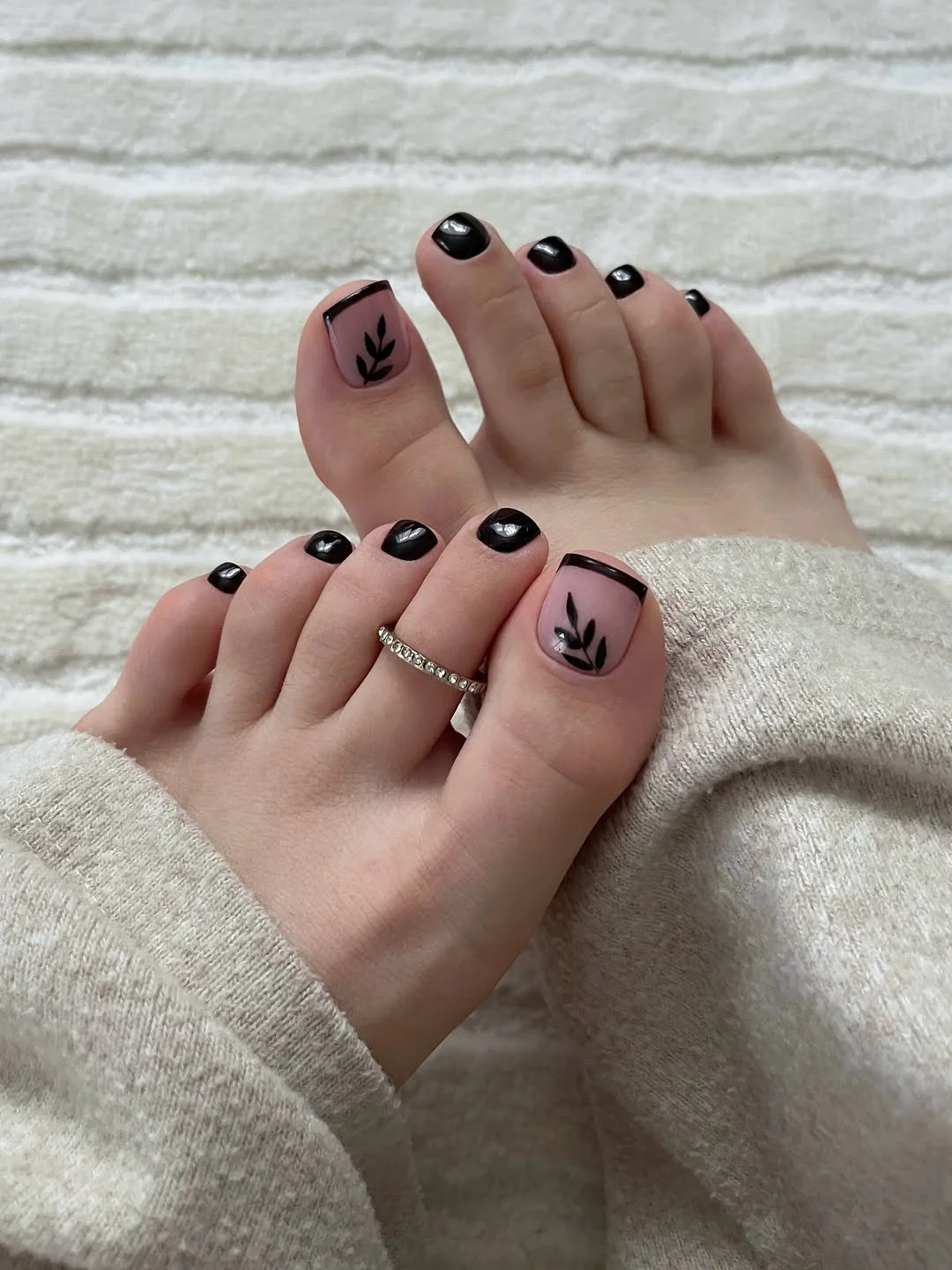 june pedicure ideas 2026 Black Botanical Pedicure With Nude Accent Nails