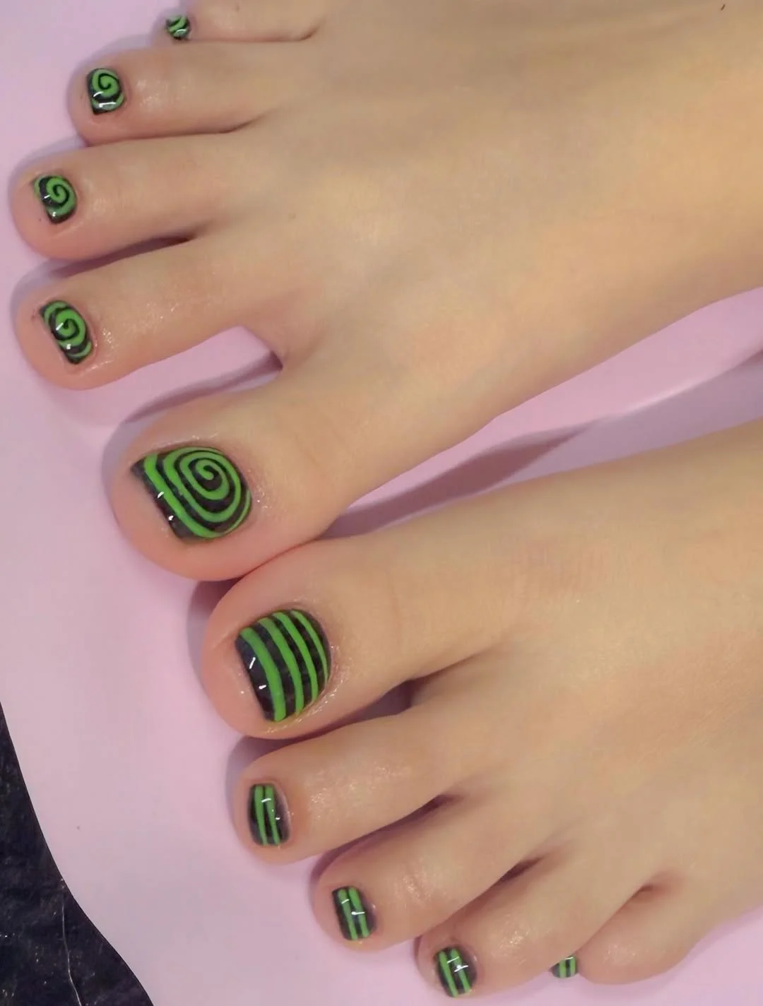 june pedicure ideas 2026 Green Swirl Pedicure With Graphic Summer Energy