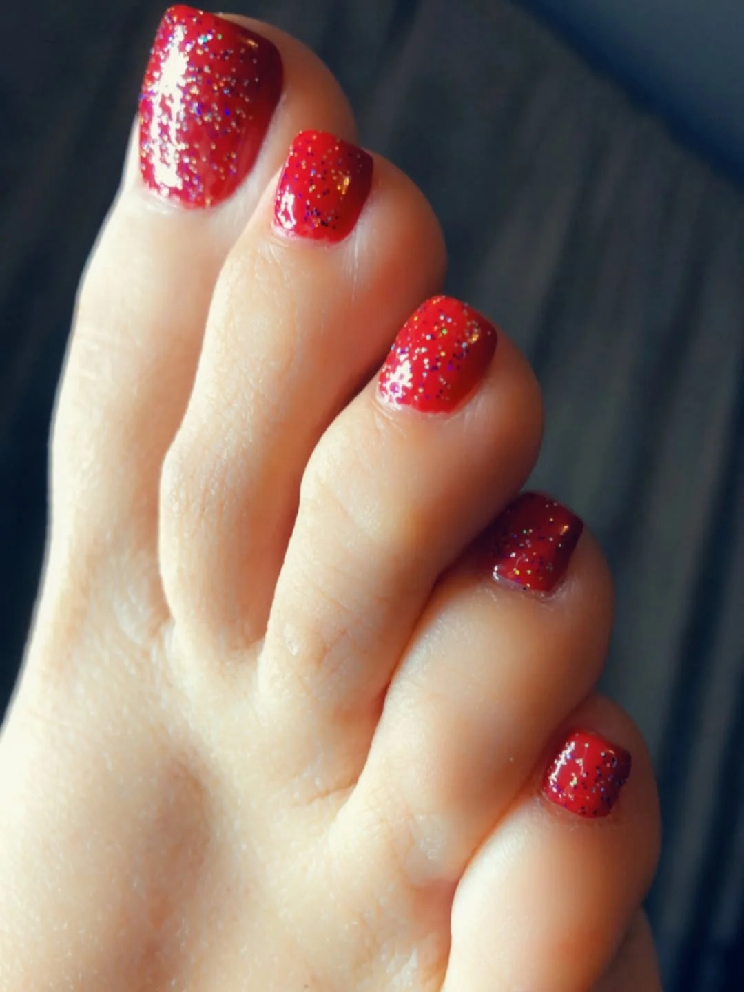 june pedicure ideas 2026 Red Glitter Pedicure With Sparkling Vacation Shine