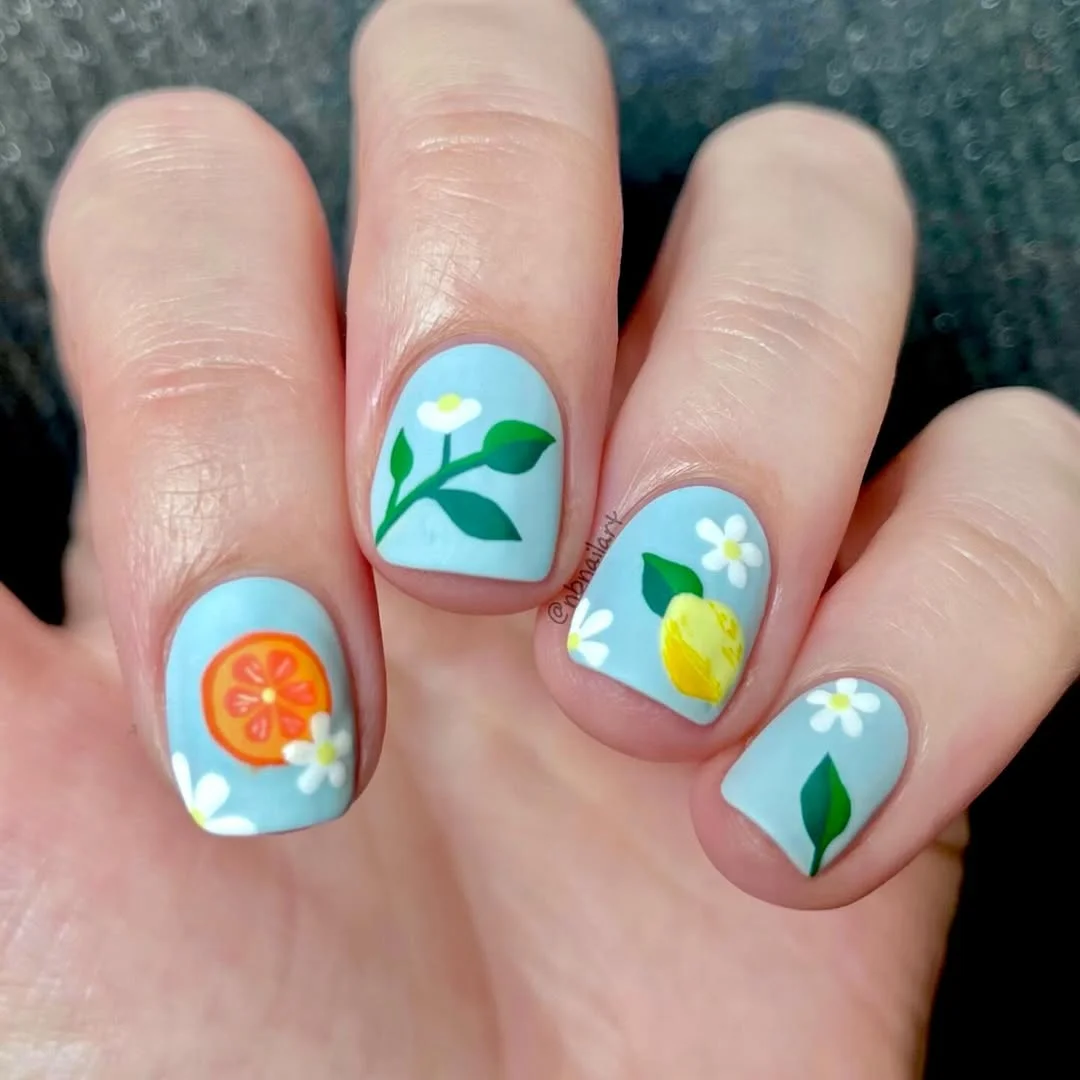 light summer nails 2026 Sky Blue Citrus Nails With Tiny Summer Flowers