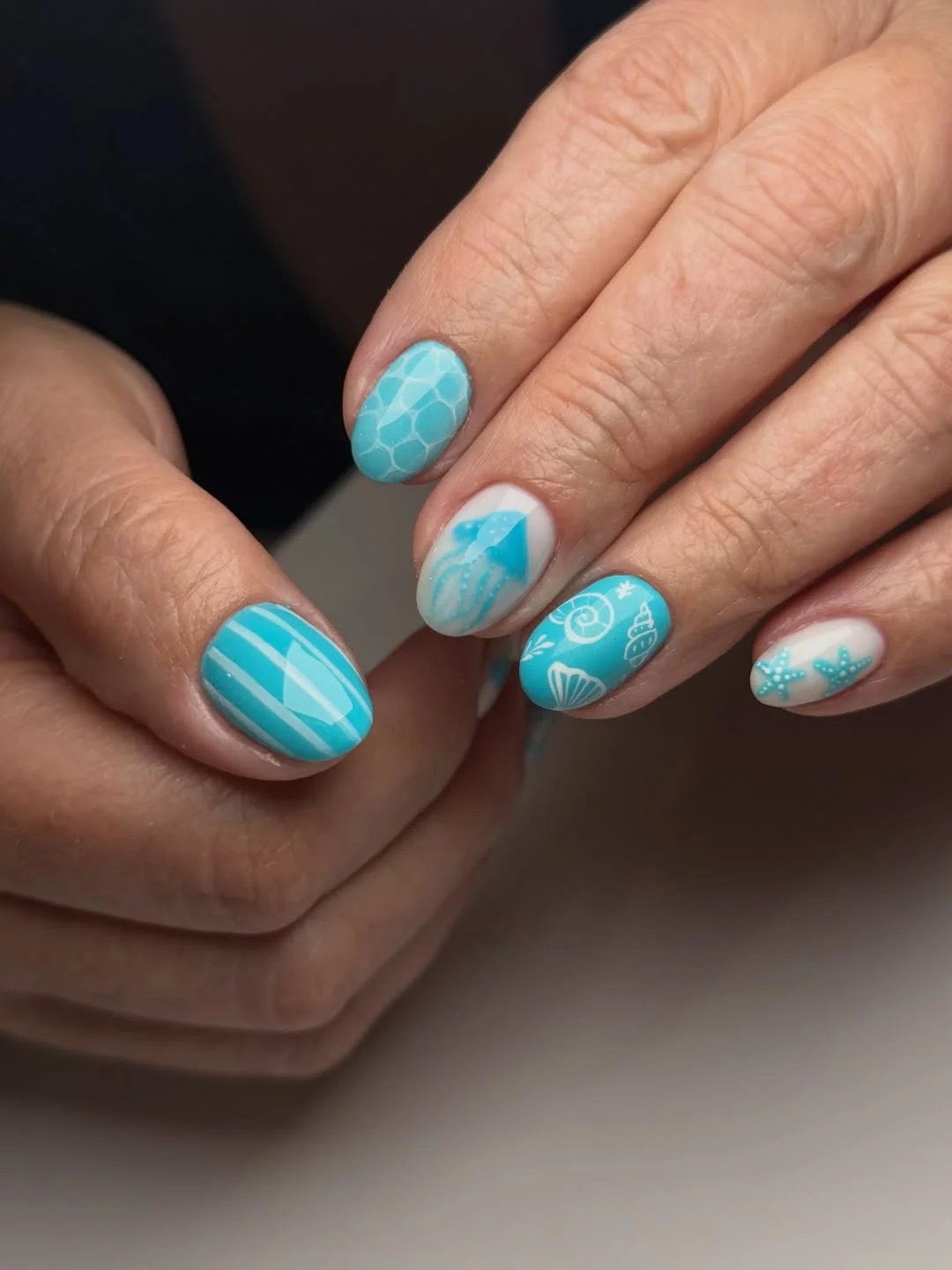light summer nails 2026 Turquoise Seaside Nails With Shell And Wave Details
