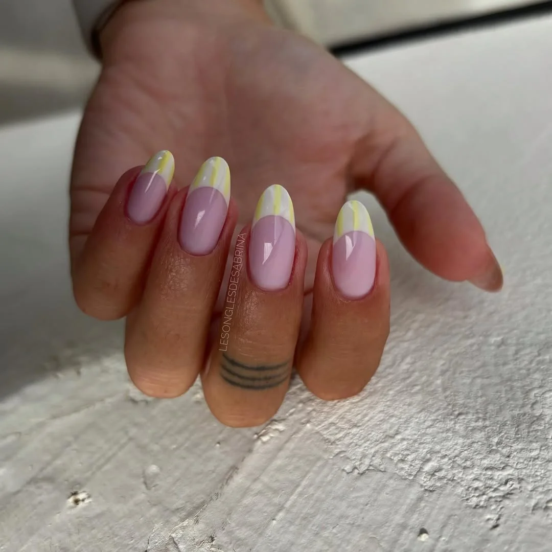 light summer nails 2026 Soft Pink Nails With Butter Yellow Striped French Tips