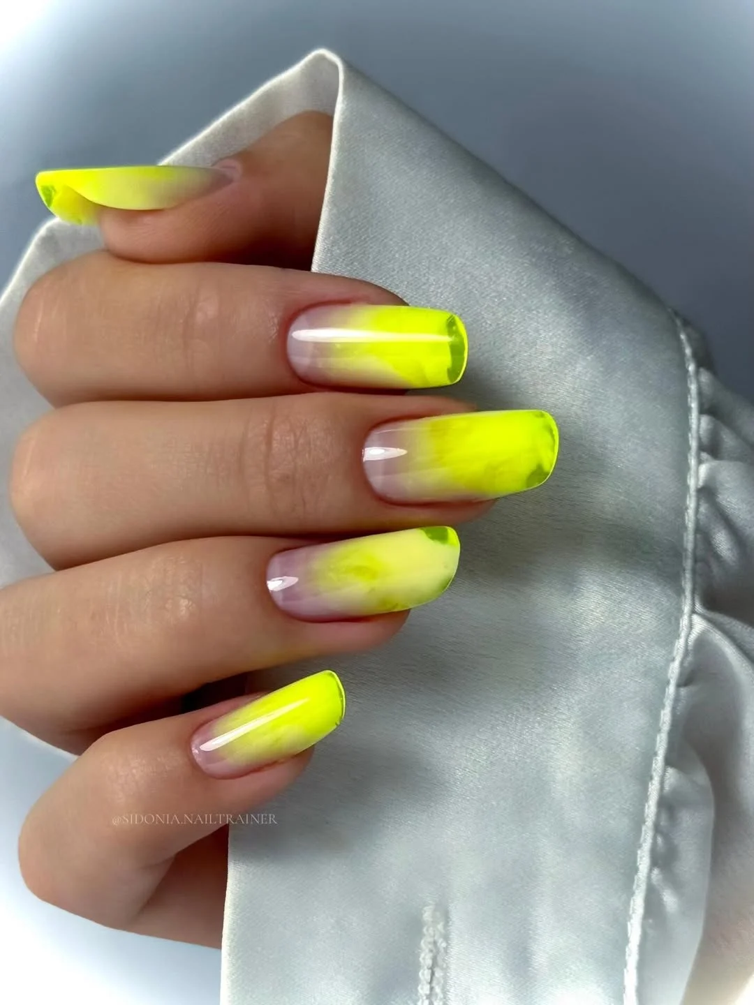 light summer nails 2026 Neon Yellow Marble Nails With A Soft Transparent Fade