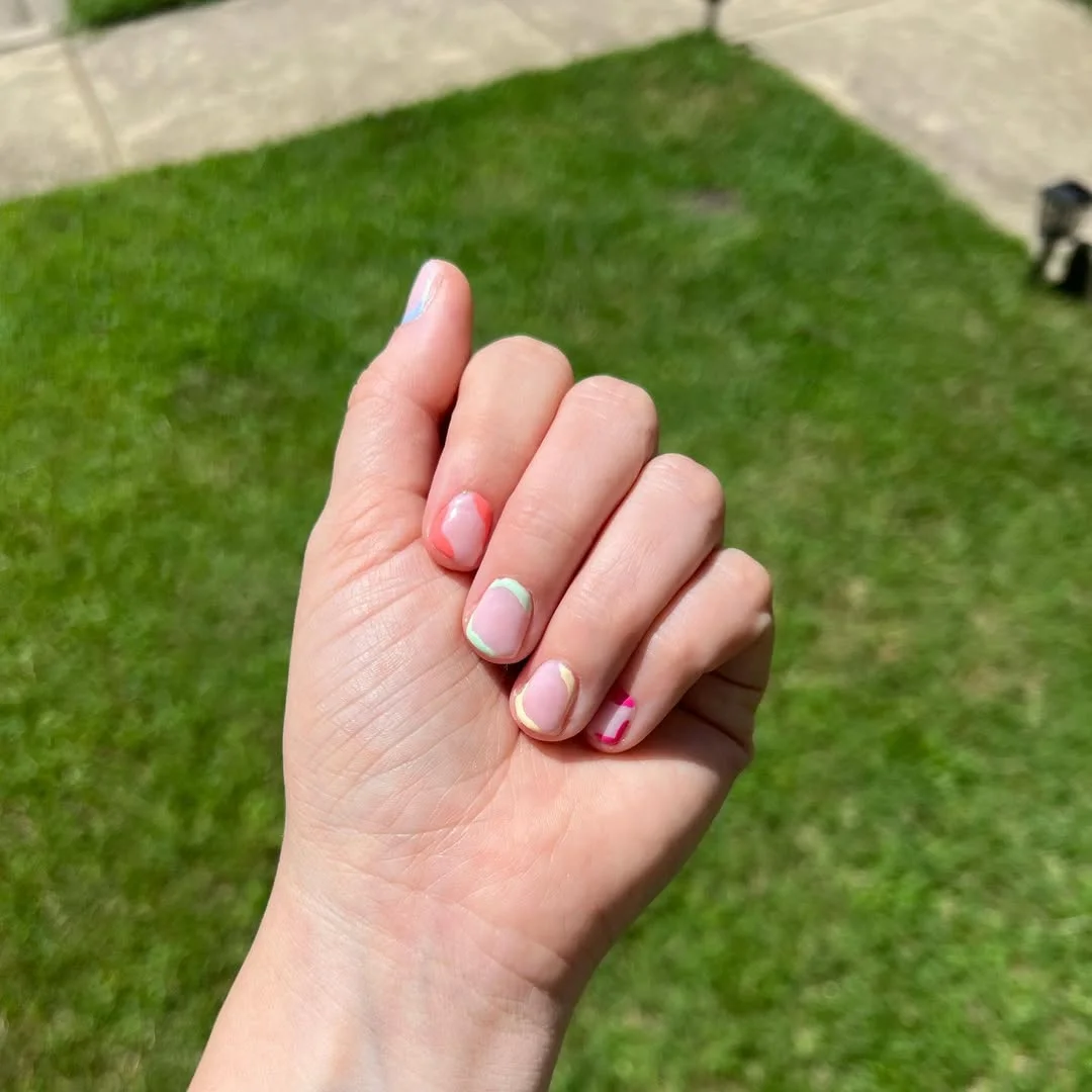 light summer nails 2026 Tiny Pastel French Nails With A Playful Summer Mix