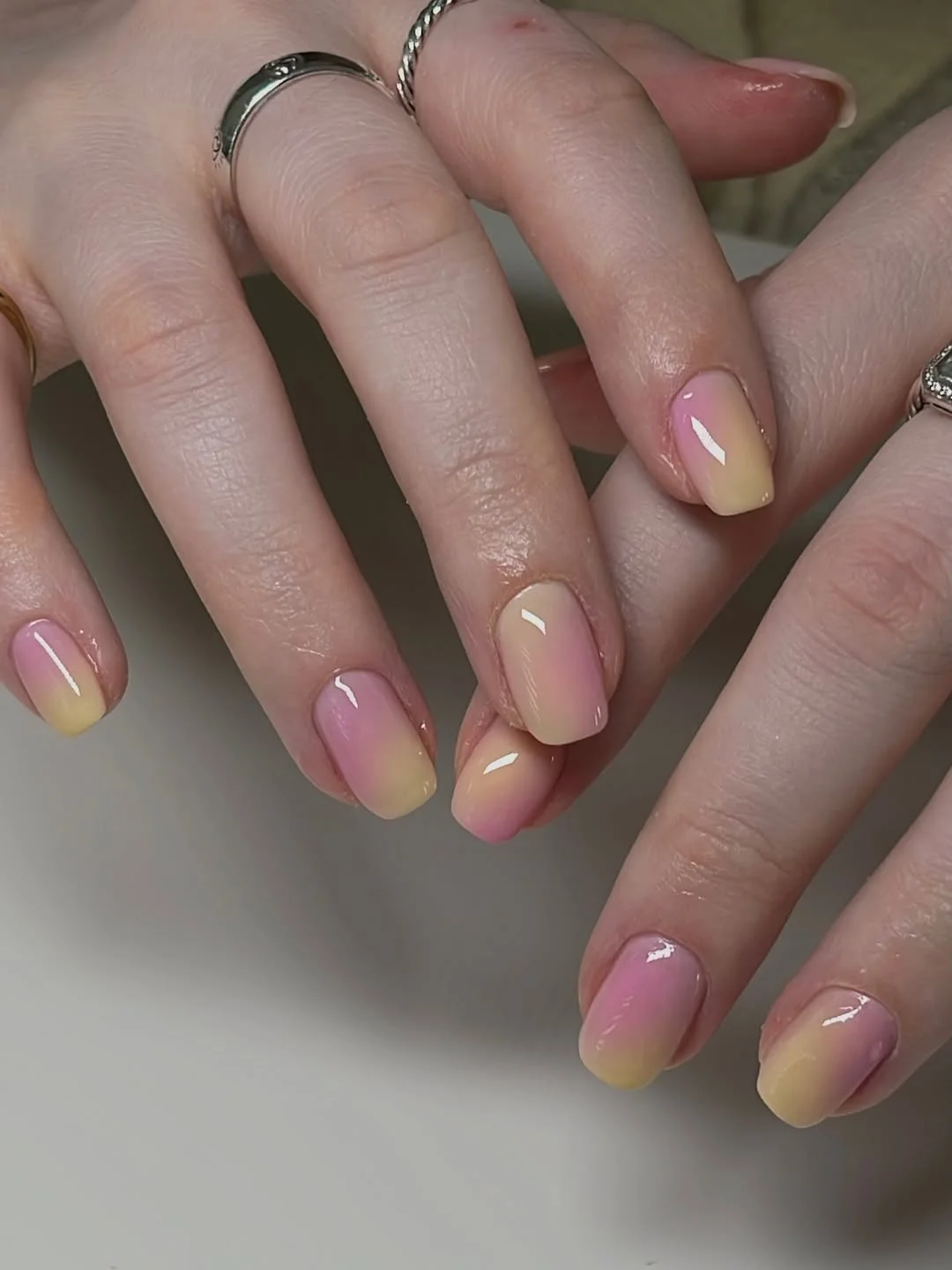 light summer nails 2026 Light Pink And Yellow Ombre Nails For A Soft Glow
