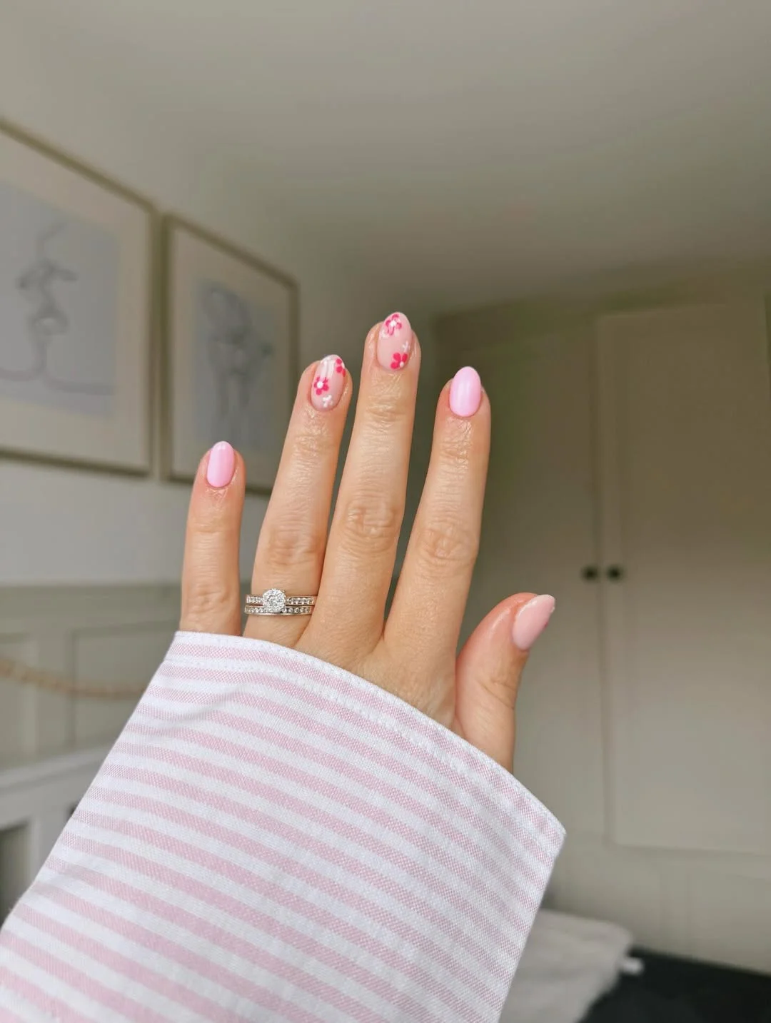 plain summer nails 2026 Soft Pink Almond Nails With Tiny Blossom Accents