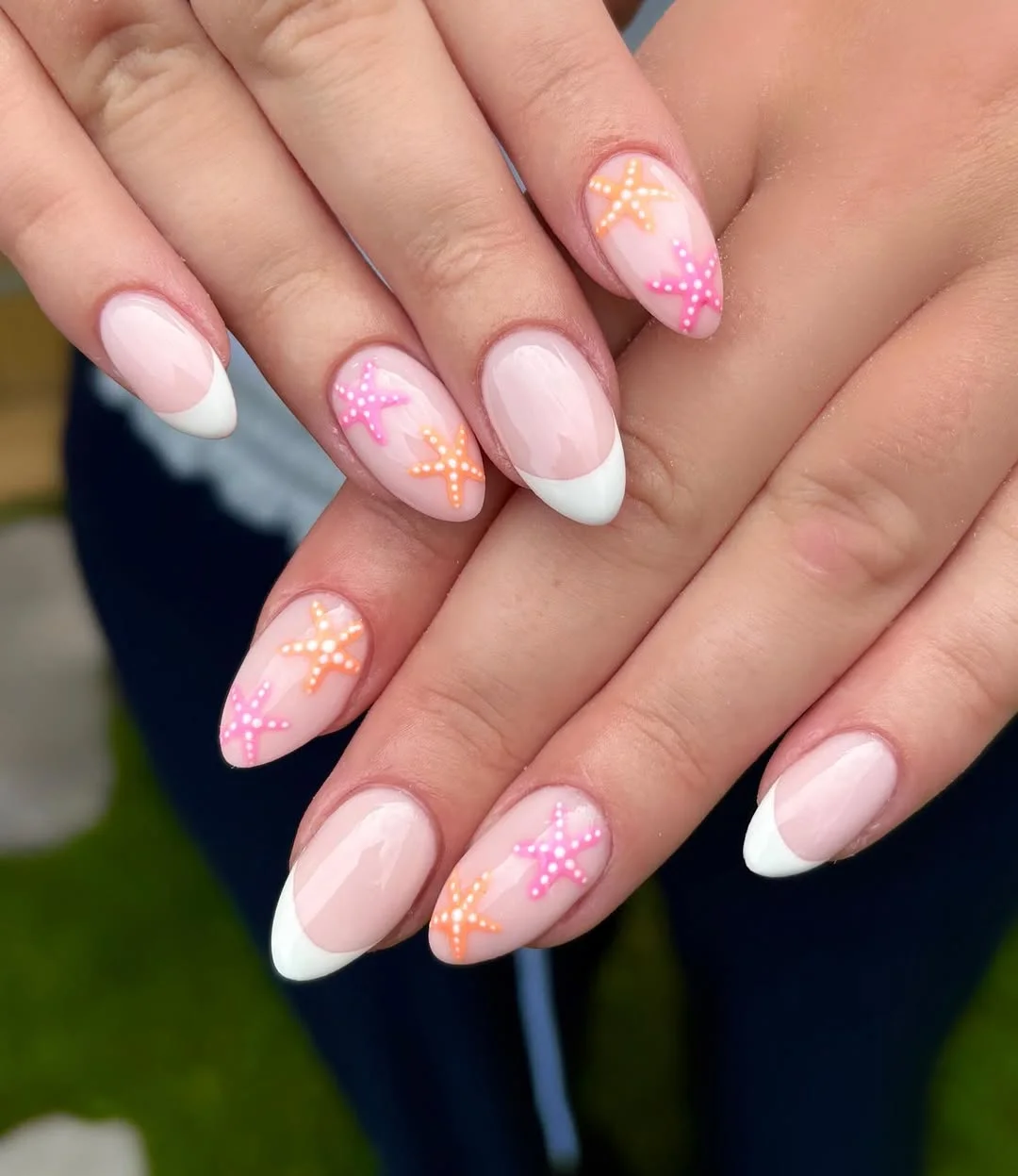 starfish summer nails 2026 Classic White French Nails With Pink And Orange Starfish