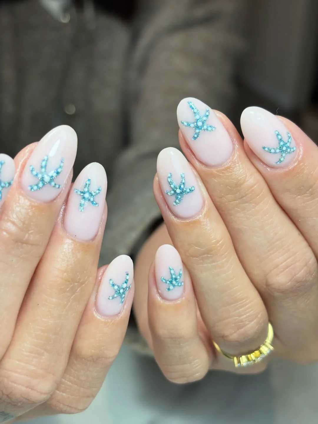 starfish summer nails 2026 Milky White Almond Nails With Aqua Crystal Starfish