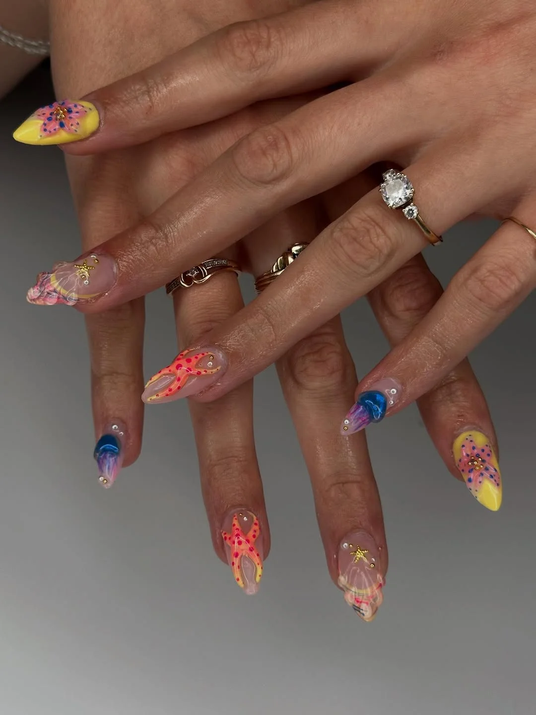 starfish summer nails 2026 Bold Jellyfish And Starfish Nails With Yellow Accents