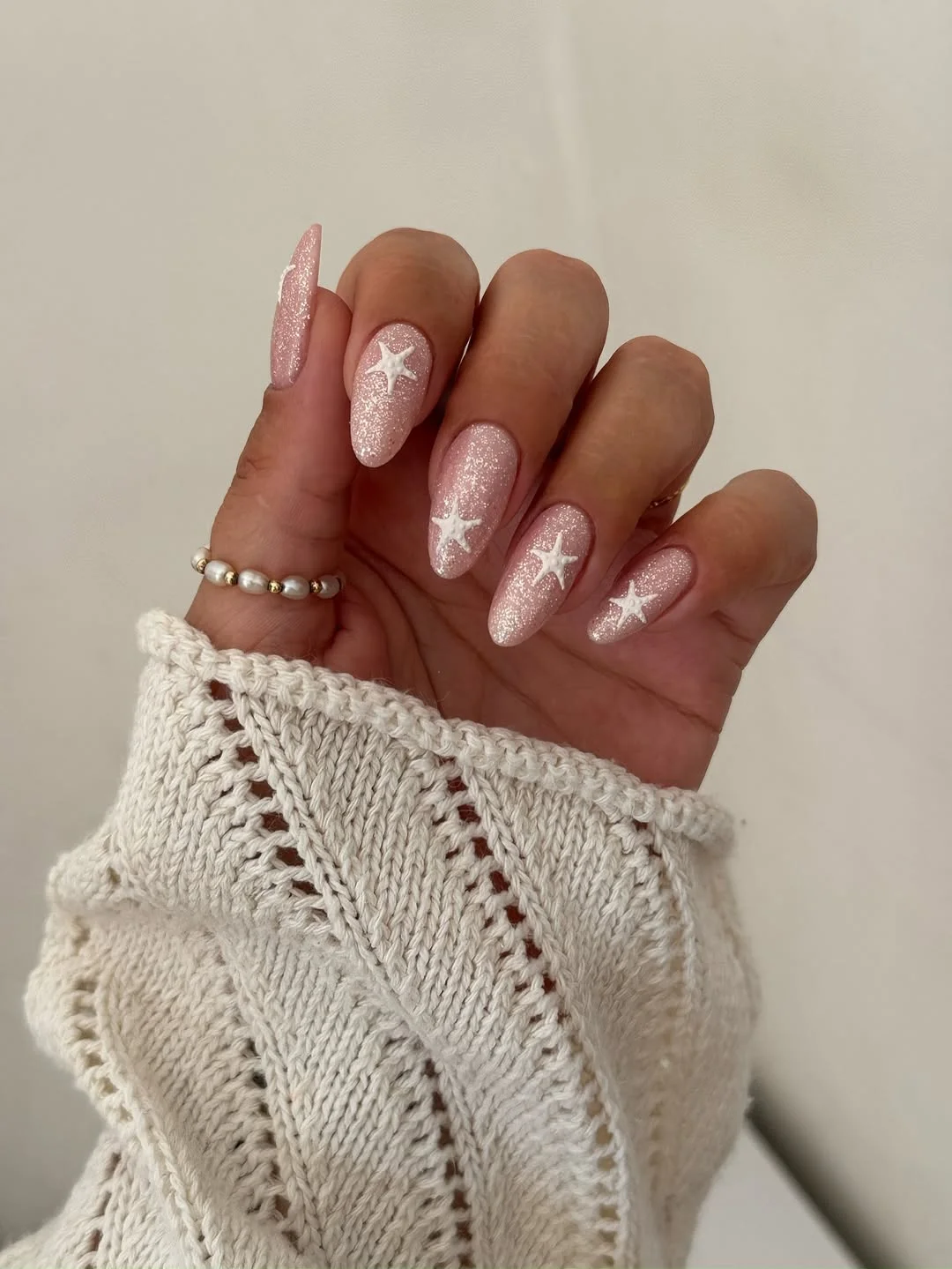 starfish summer nails 2026 Pink Glitter Almond Nails With White Starfish