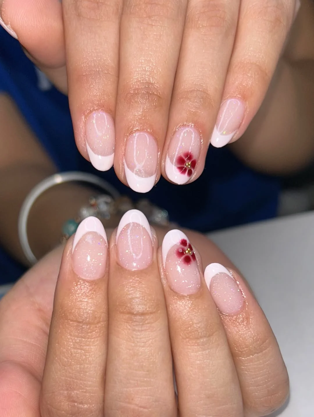 summer oval nails 2026 Pink Glitter French Oval Nails With Red Floral Accents