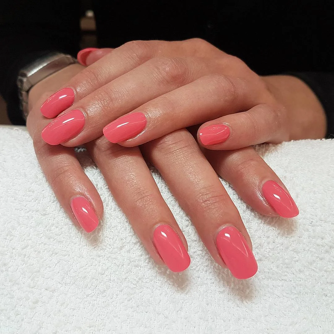 summer oval nails 2026 Coral Pink Oval Nails In A Juicy Solid Color