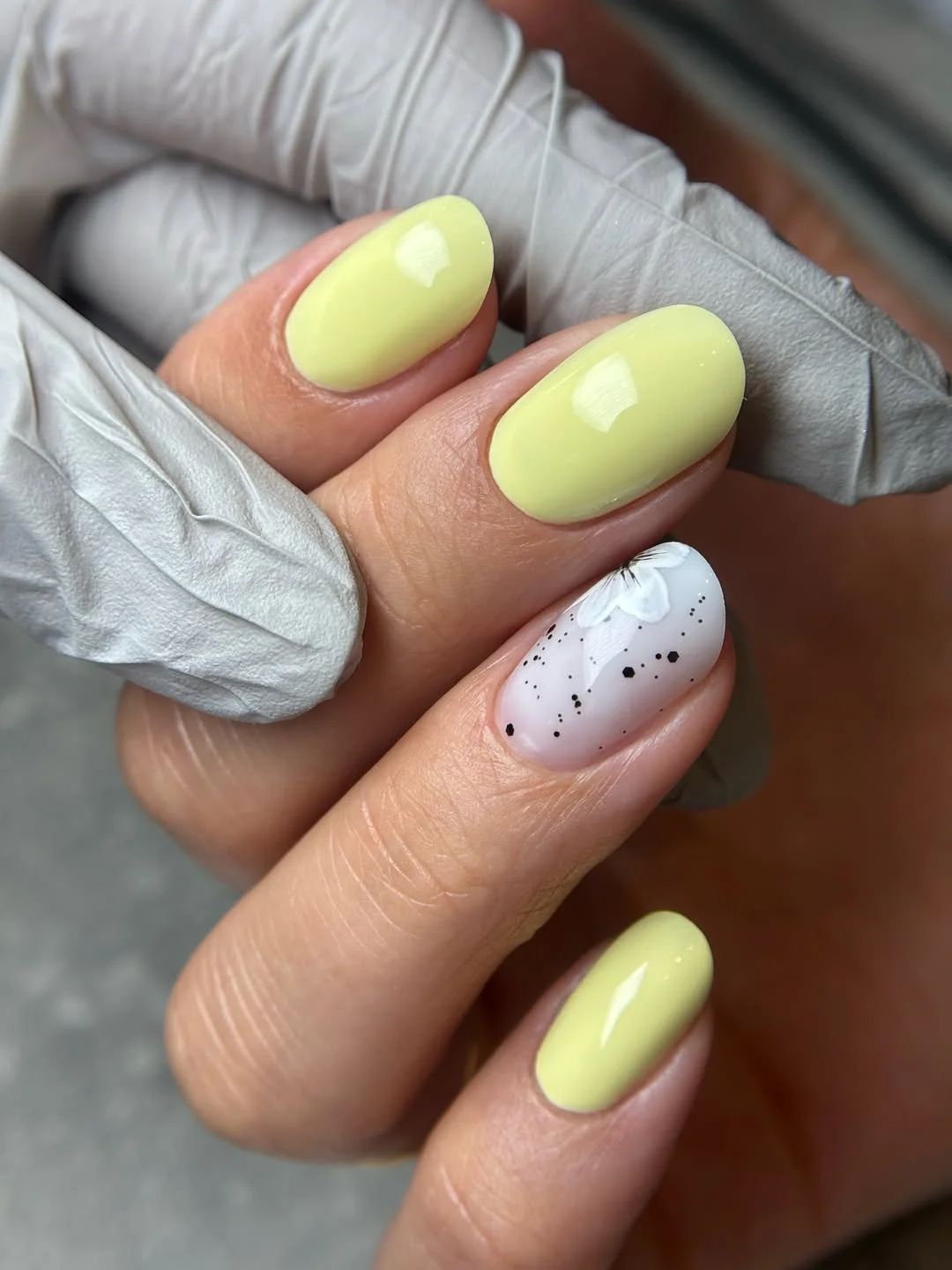 summer oval nails 2026 Lemon Yellow Oval Nails With A White Floral Accent