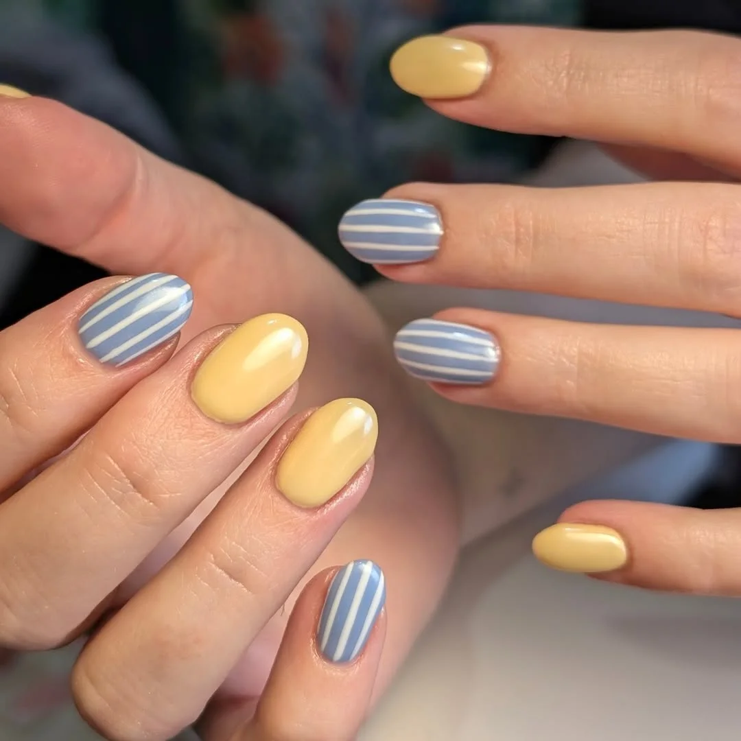 summer oval nails 2026 Pastel Yellow And Blue Striped Oval Nails