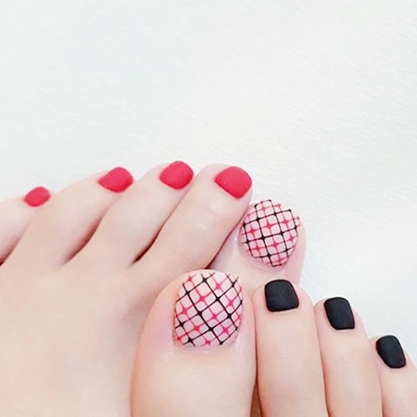 summer pedicure nail art 2026 Red And Black Fishnet Pedicure With A Graphic Summer Edge