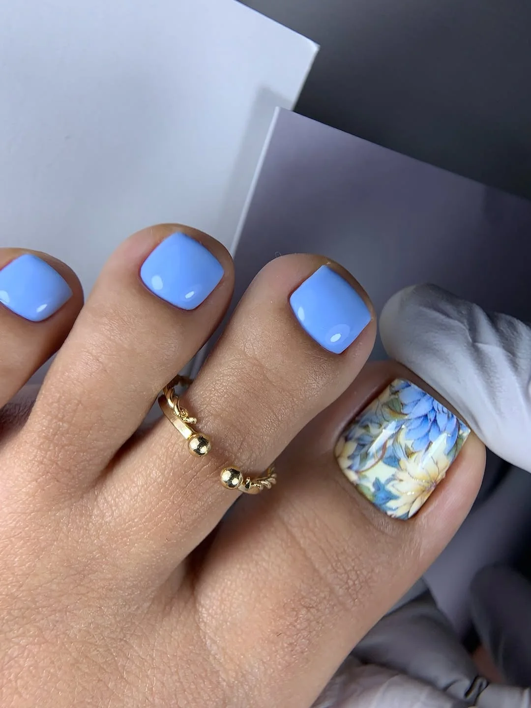summer pedicure nail art 2026 Sky Blue Pedicure With A Painted Floral Accent