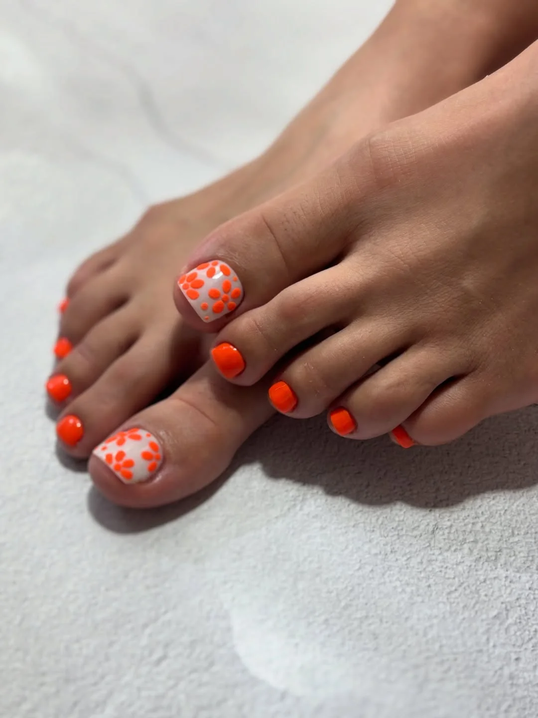 summer toe nails design ideas 2026 Orange Daisy Pedicure With A Fresh White Accent