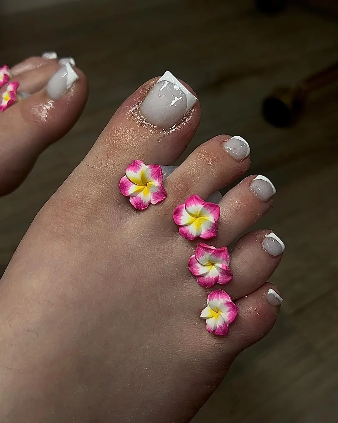 summer white french toes 2026 Tropical Flower Accent With White French Toes